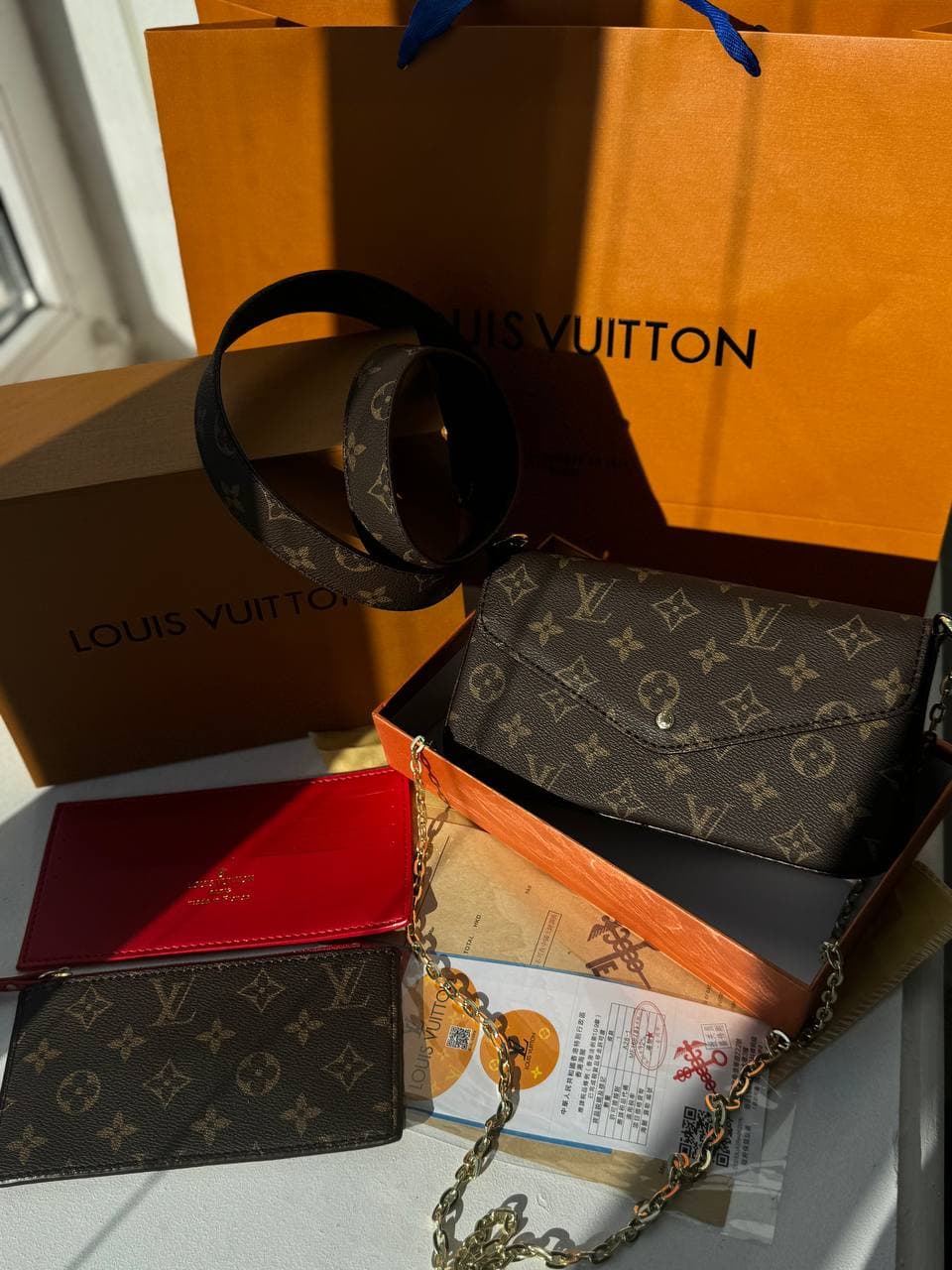 Сумка-клатч Louis Vuitton Felicie Pochette